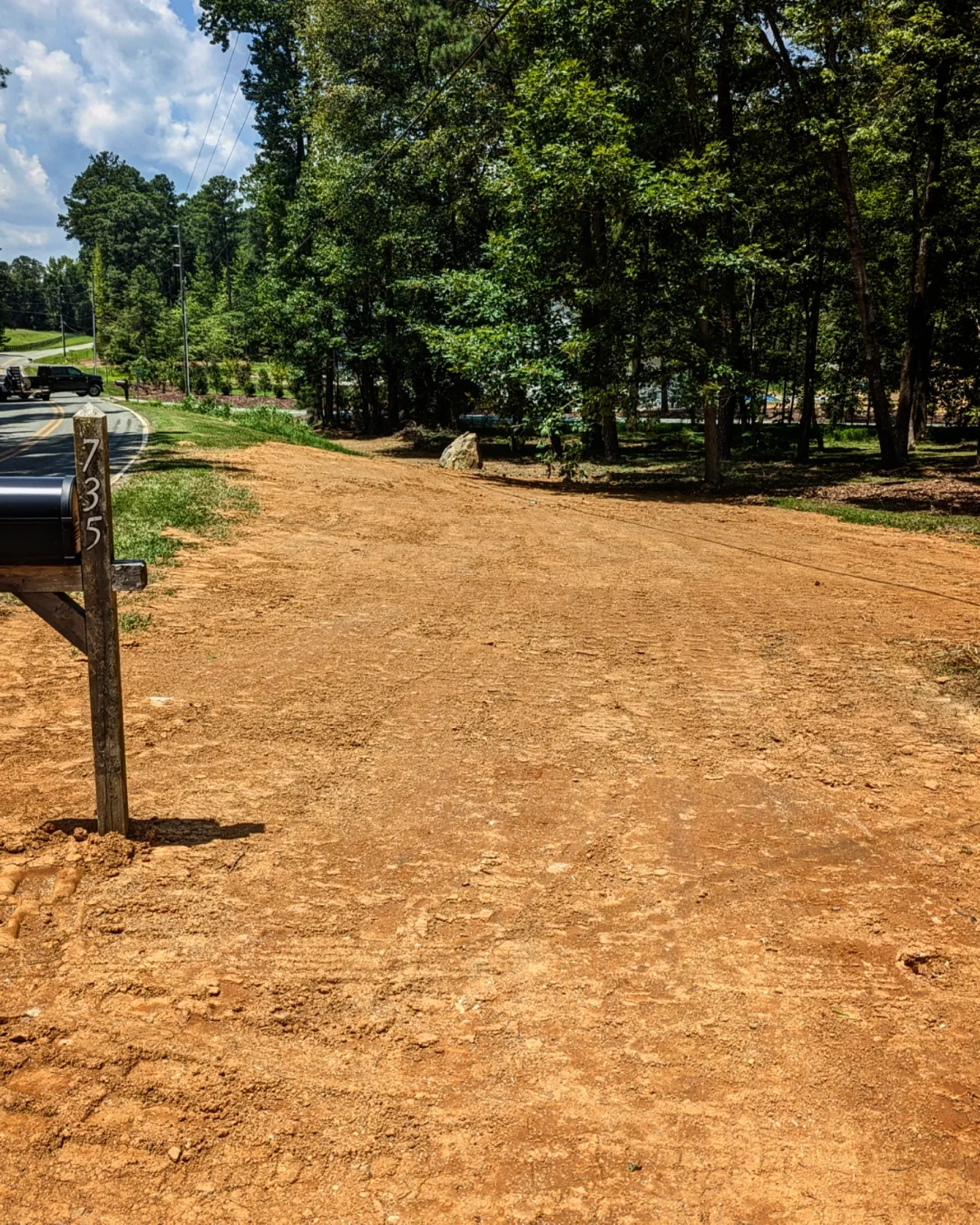 Properly graded yard sloping away from foundation