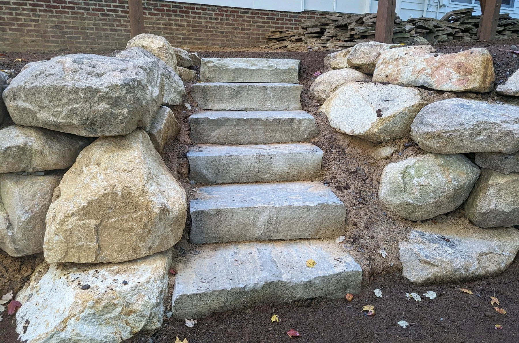 Natural stone steps and seating area